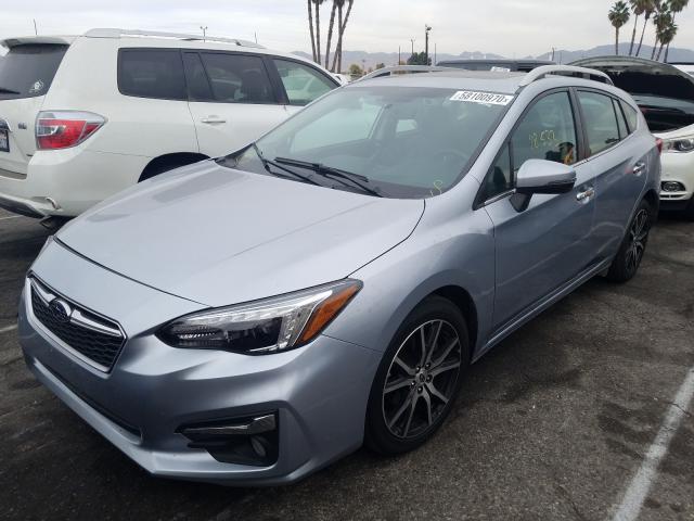 Photo 1 VIN: 4S3GTAT65J3700642 - SUBARU IMPREZA 