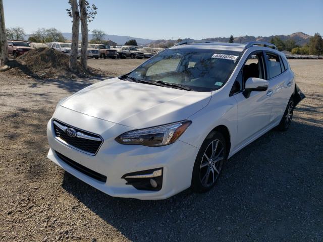 Photo 1 VIN: 4S3GTAU60J3700580 - SUBARU IMPREZA LI 