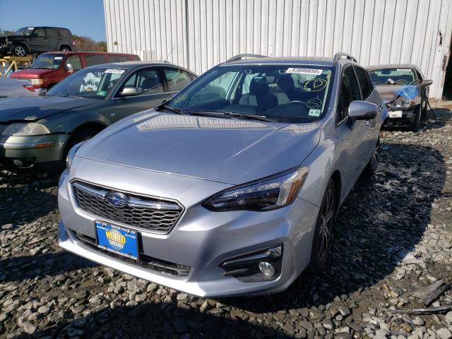 Photo 1 VIN: 4S3GTAU62J3718689 - SUBARU IMPREZA LI 