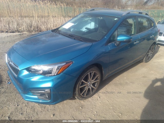 Photo 1 VIN: 4S3GTAU69J3705003 - SUBARU IMPREZA 