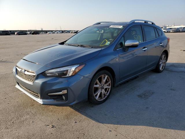 Photo 1 VIN: 4S3GTAU69J3725509 - SUBARU IMPREZA LI 