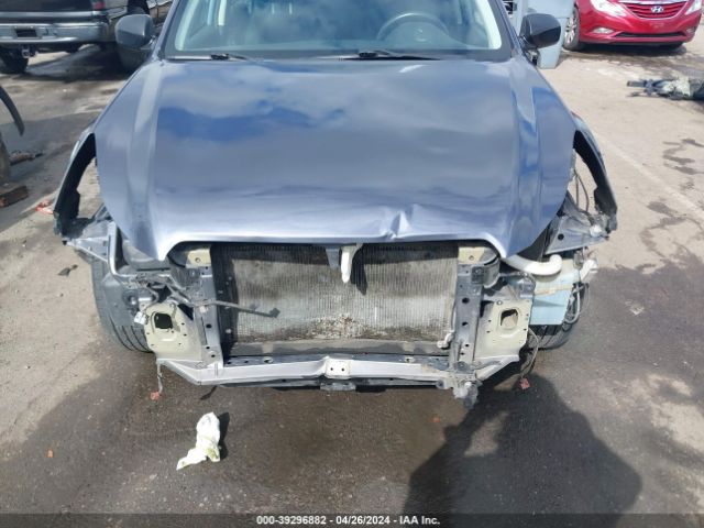 Photo 5 VIN: 4S4BRBAC3E3239479 - SUBARU OUTBACK 