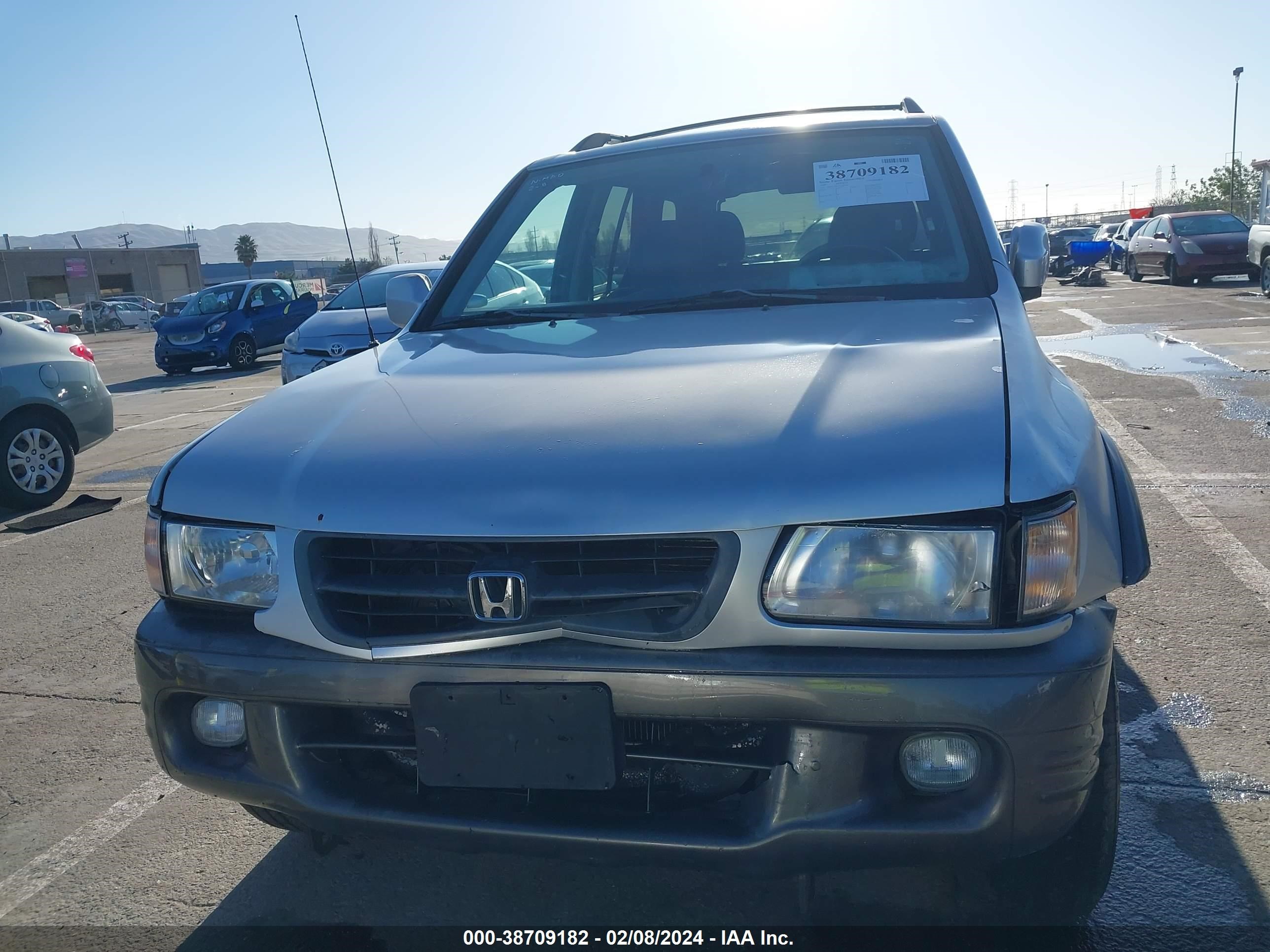 Photo 5 VIN: 4S6CK58W1Y4407023 - HONDA PASSPORT 