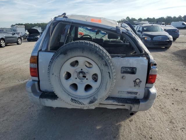 Photo 5 VIN: 4S6CK58W424401210 - HONDA PASSPORT E 