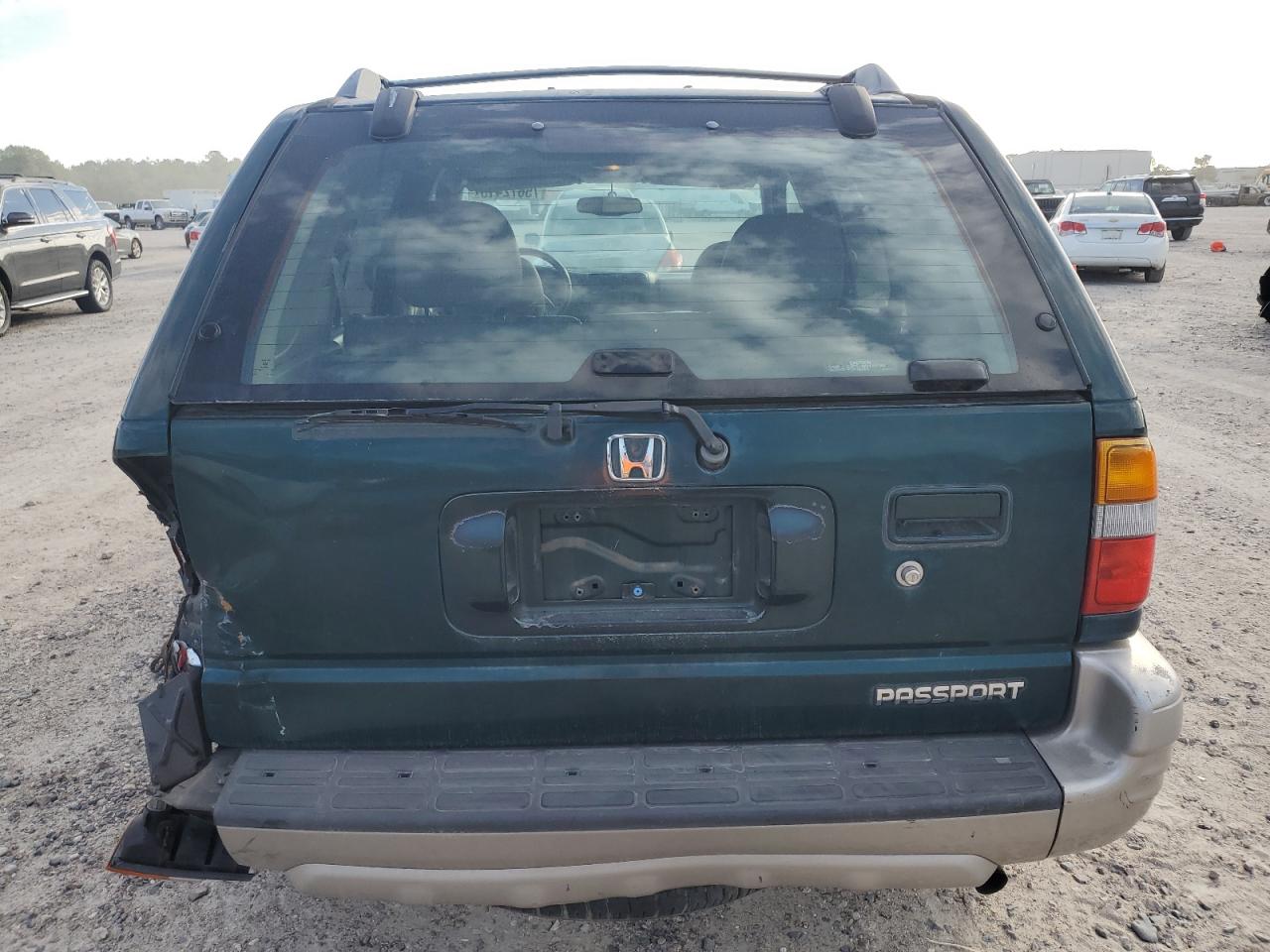 Photo 5 VIN: 4S6CK58WXY4405822 - HONDA PASSPORT 