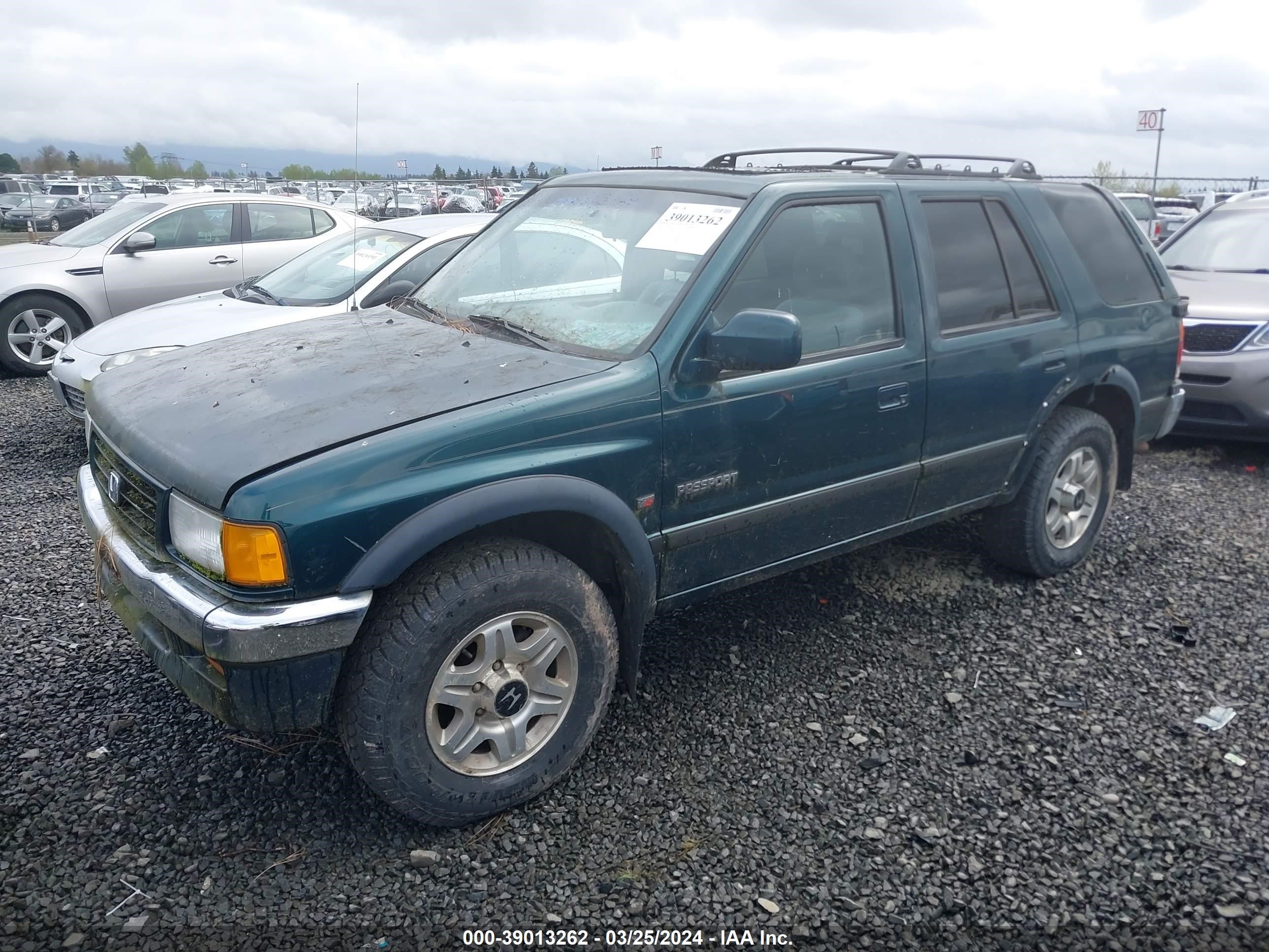 Photo 1 VIN: 4S6CM58V1V4418780 - HONDA PASSPORT 