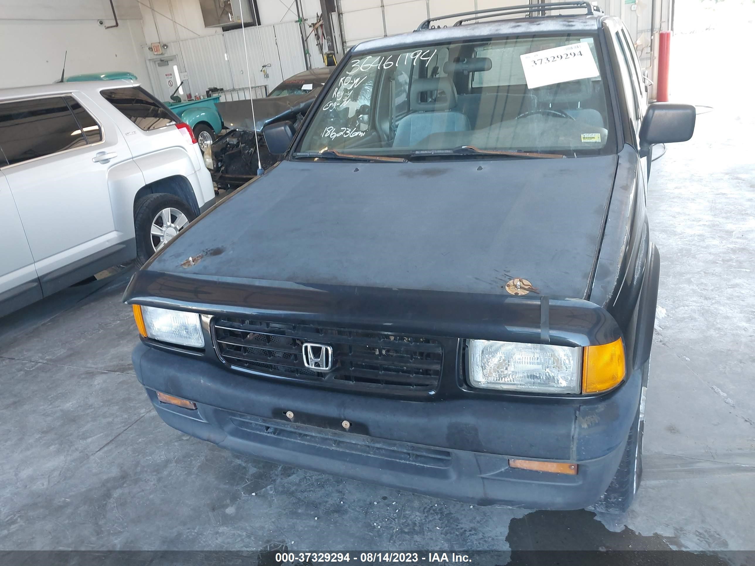 Photo 5 VIN: 4S6CM58VXT4405510 - HONDA PASSPORT 