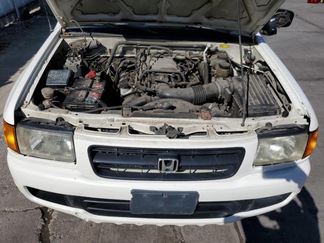 Photo 11 VIN: 4S6CM58W2X4418394 - HONDA PASSPORT 