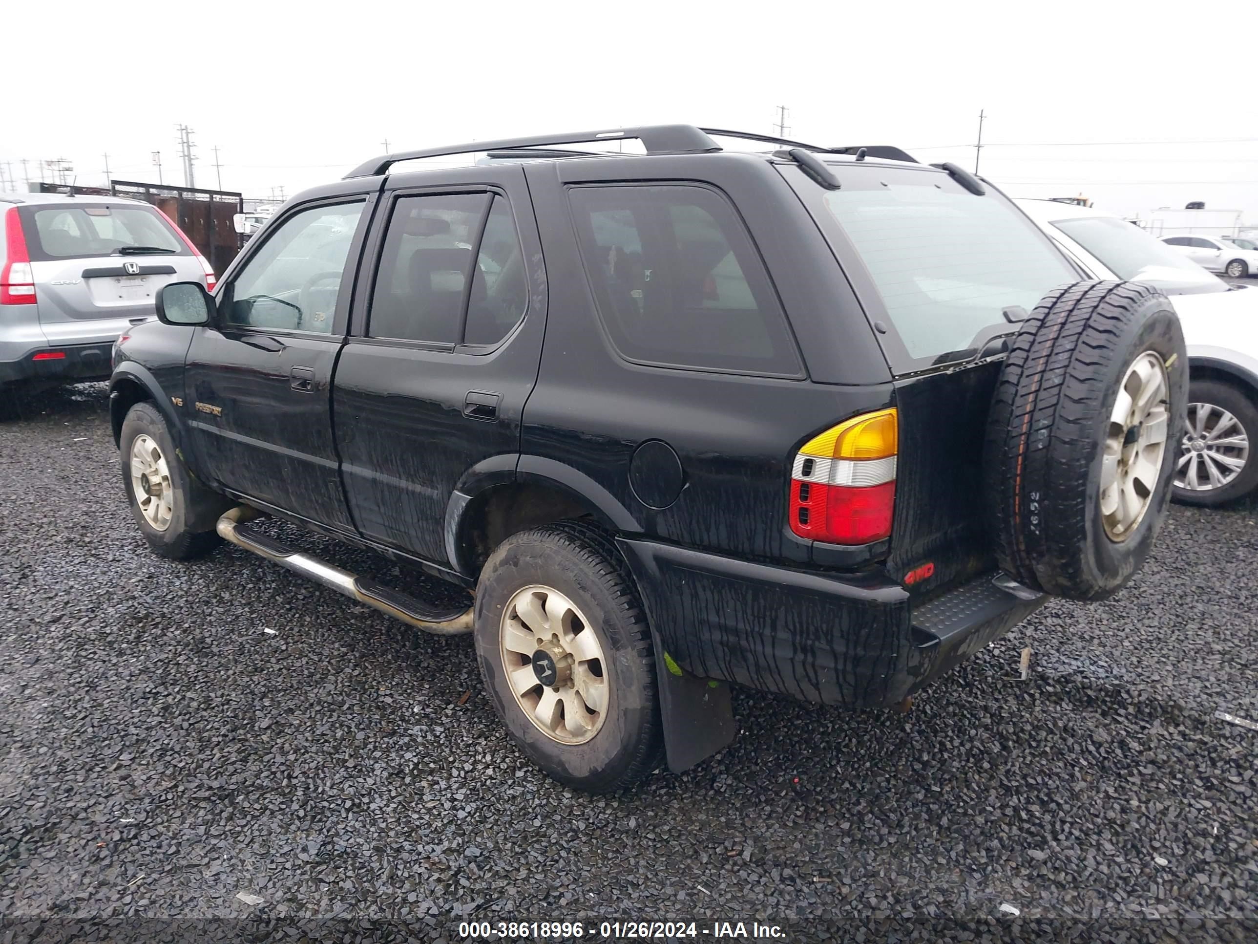 Photo 2 VIN: 4S6CM58W7X4425535 - HONDA PASSPORT 