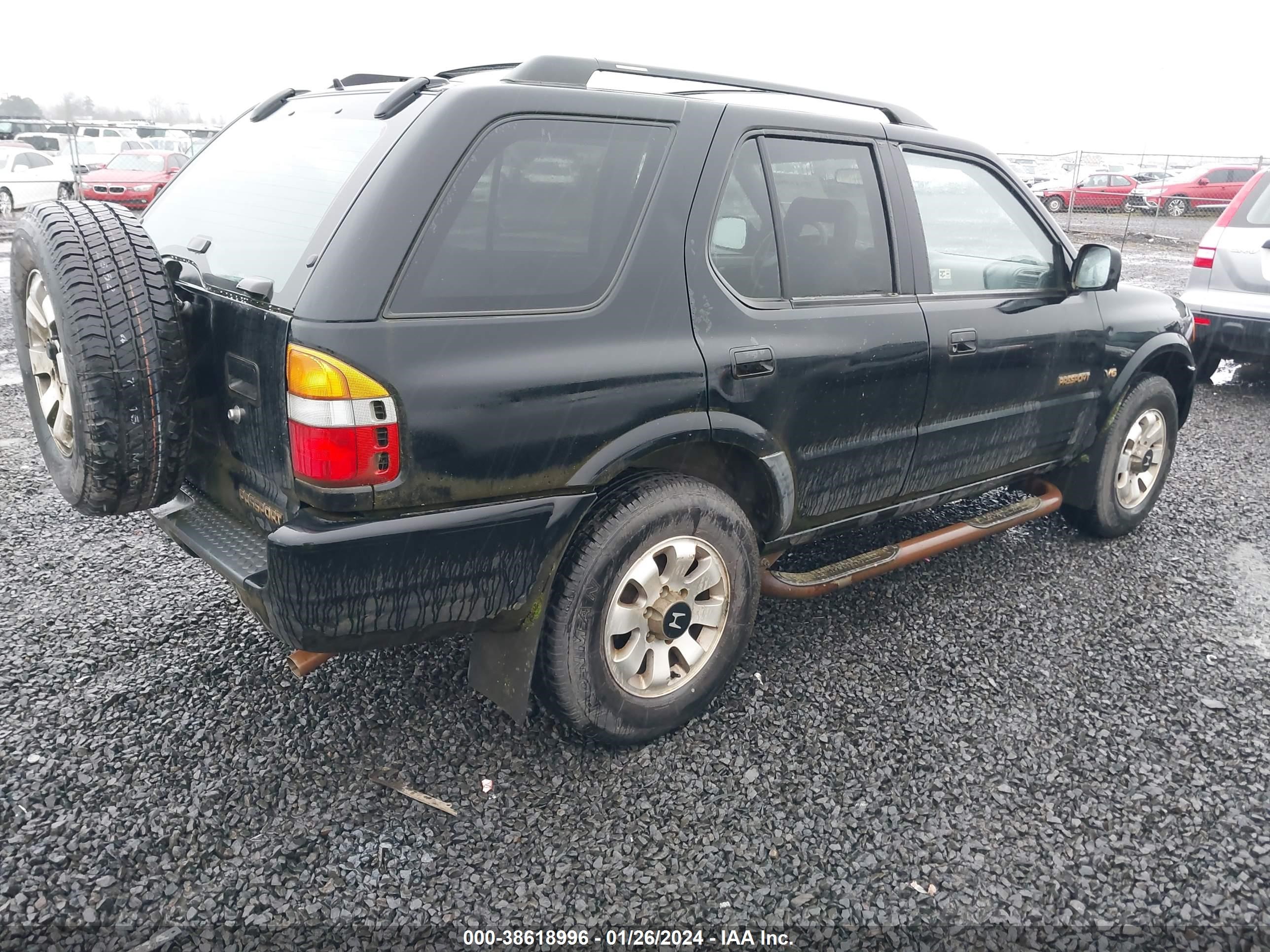 Photo 3 VIN: 4S6CM58W7X4425535 - HONDA PASSPORT 