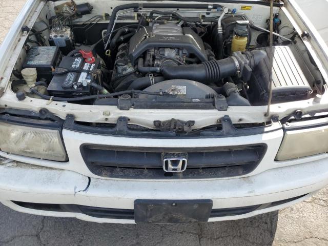 Photo 10 VIN: 4S6CM58W8W4413361 - HONDA PASSPORT 