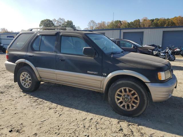 Photo 3 VIN: 4S6DM58W324404520 - HONDA PASSPORT E 