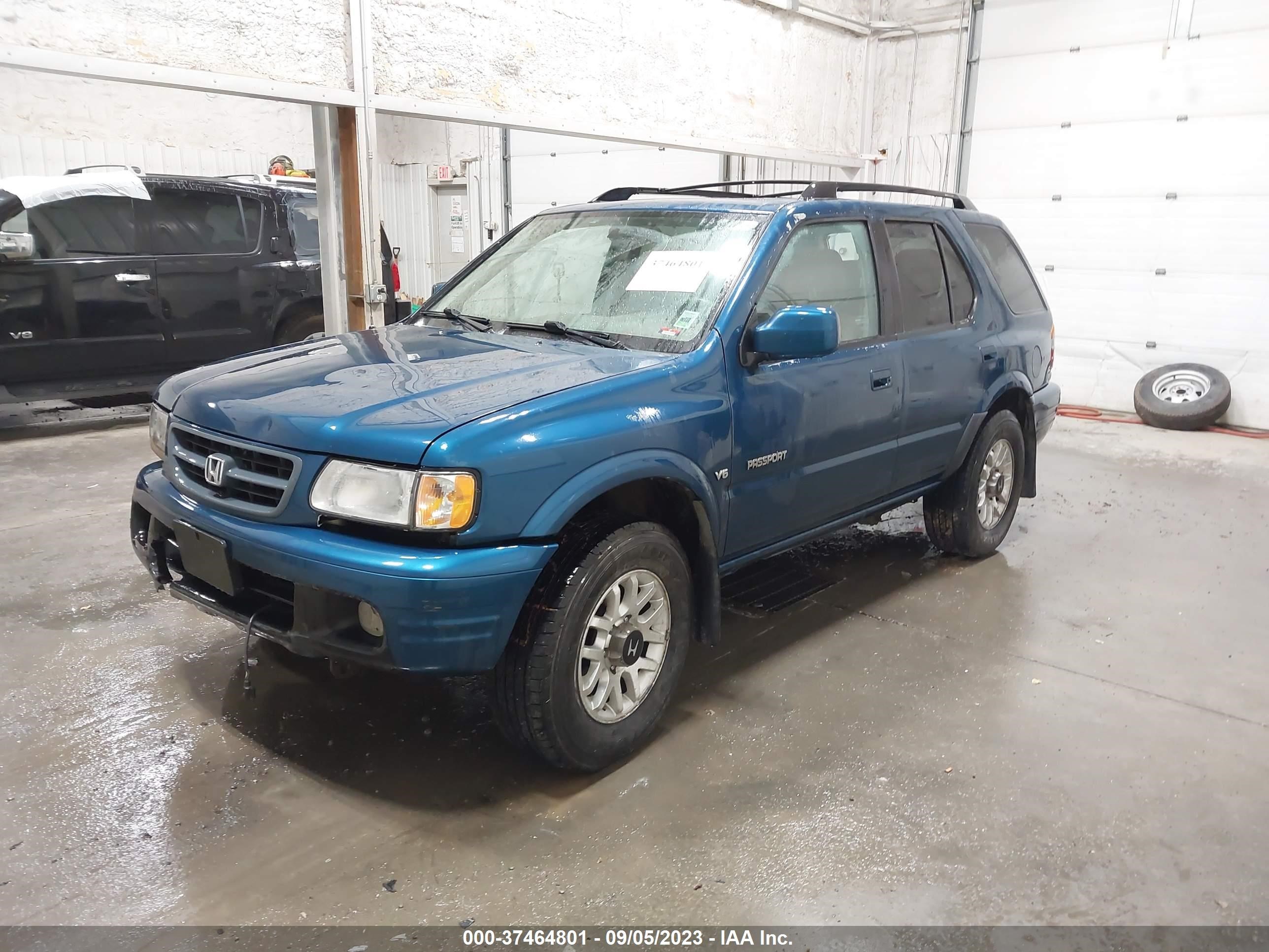 Photo 1 VIN: 4S6DM58W3Y4406969 - HONDA PASSPORT 