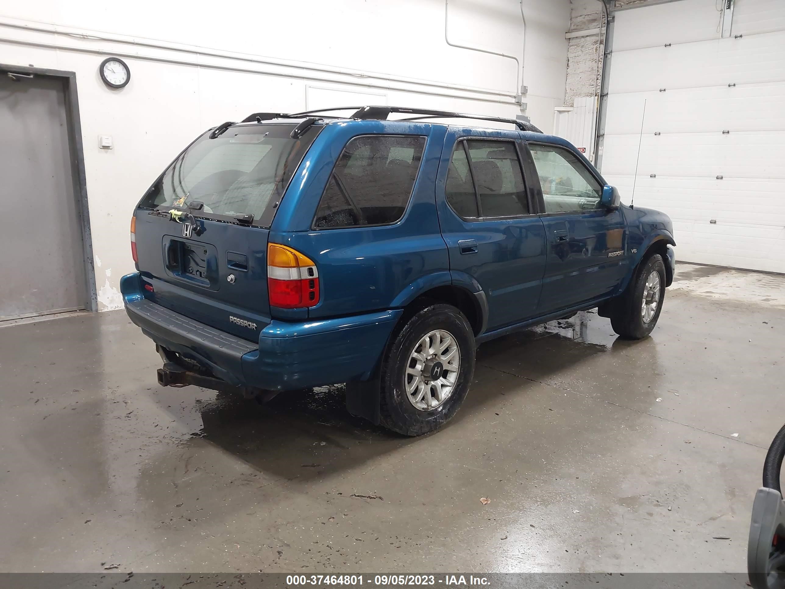 Photo 3 VIN: 4S6DM58W3Y4406969 - HONDA PASSPORT 