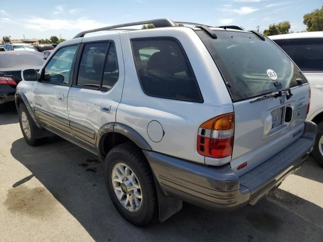 Photo 1 VIN: 4S6DM58W924404294 - HONDA PASSPORT E 