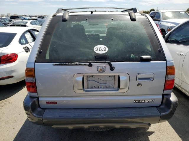 Photo 5 VIN: 4S6DM58W924404294 - HONDA PASSPORT E 