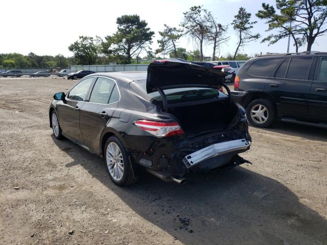 Photo 2 VIN: 4T1B21HK9KU518159 - TOYOTA CAMRY HYBR 