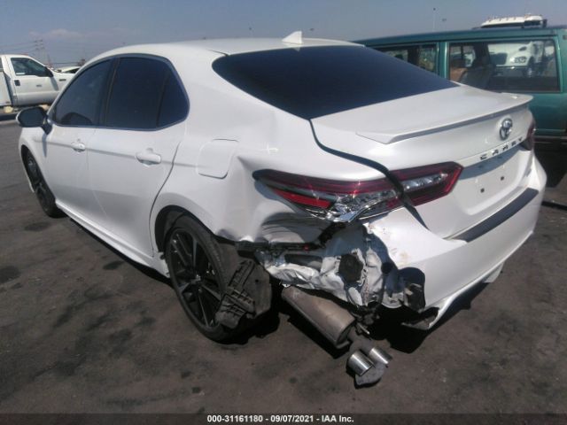 Photo 5 VIN: 4T1B61HK1KU689783 - TOYOTA CAMRY 