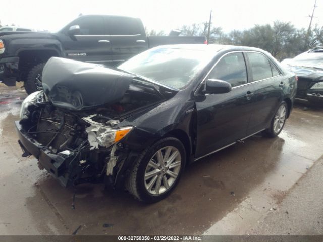 Photo 1 VIN: 4T1BD1FK1CU061149 - TOYOTA CAMRY HYBRID 