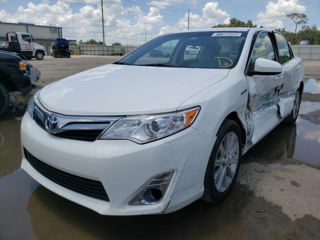 Photo 1 VIN: 4T1BD1FK1EU104729 - TOYOTA CAMRY HYBR 