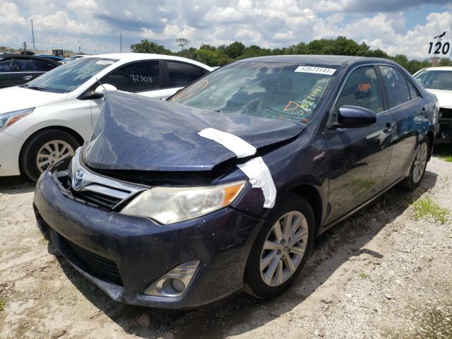 Photo 1 VIN: 4T1BD1FK1EU113687 - TOYOTA CAMRY HYBR 