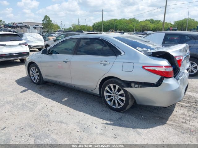 Photo 2 VIN: 4T1BD1FK1GU195083 - TOYOTA CAMRY HYBRID 