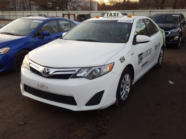 Photo 1 VIN: 4T1BD1FK2EU104240 - TOYOTA CAMRY HYBR 