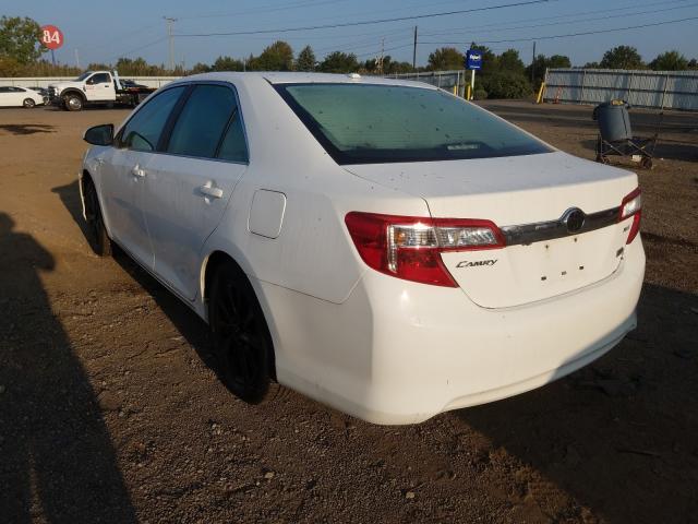 Photo 2 VIN: 4T1BD1FK3CU058009 - TOYOTA CAMRY HYBR 