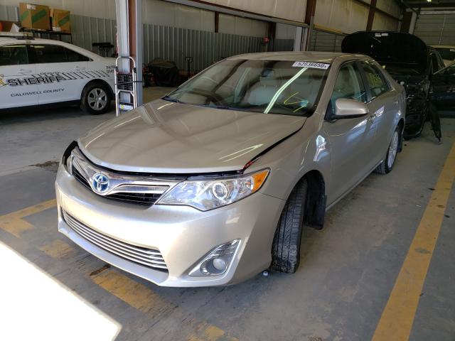 Photo 1 VIN: 4T1BD1FK4EU133075 - TOYOTA CAMRY HYBR 