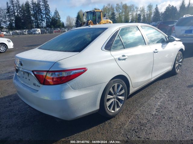 Photo 3 VIN: 4T1BD1FK4FU160696 - TOYOTA CAMRY HYBRID 