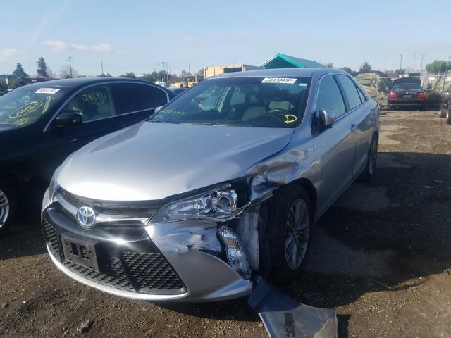 Photo 1 VIN: 4T1BD1FK4FU168815 - TOYOTA CAMRY HYBR 