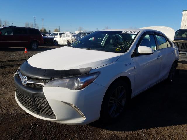 Photo 1 VIN: 4T1BD1FK5FU144779 - TOYOTA CAMRY HYBR 