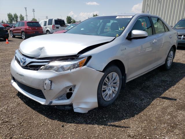 Photo 1 VIN: 4T1BD1FK6CU052611 - TOYOTA CAMRY HYBR 