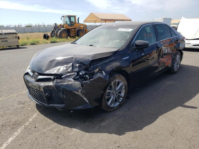 Photo 1 VIN: 4T1BD1FK6FU158934 - TOYOTA CAMRY HYBR 