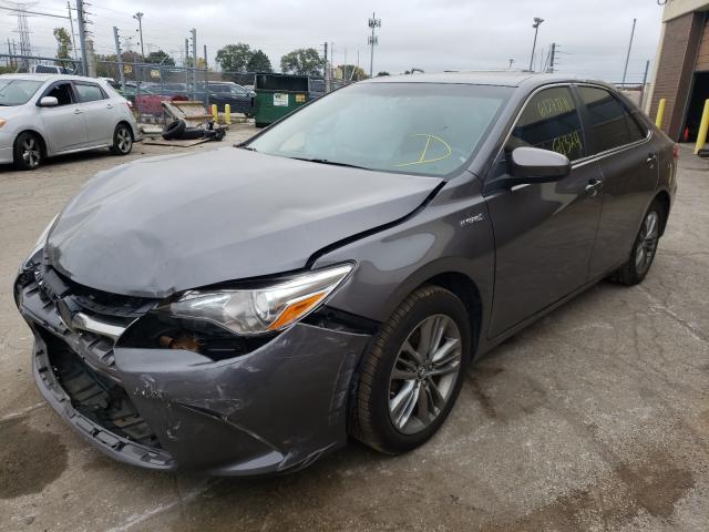 Photo 1 VIN: 4T1BD1FK7FU174575 - TOYOTA CAMRY HYBR 