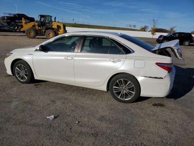 Photo 1 VIN: 4T1BD1FK9FU144882 - TOYOTA CAMRY HYBR 