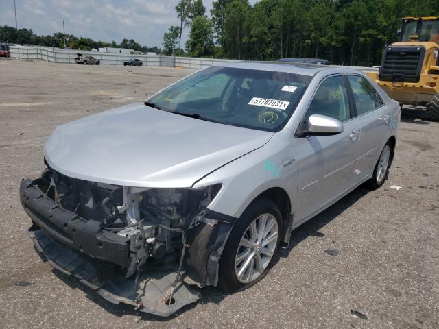 Photo 1 VIN: 4T1BD1FKXCU037061 - TOYOTA CAMRY HYBR 