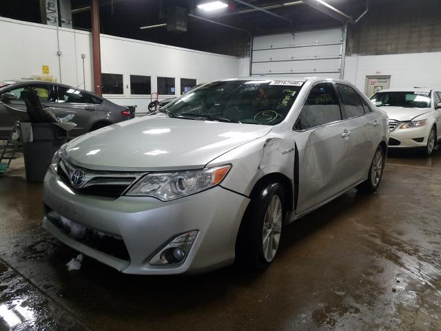 Photo 1 VIN: 4T1BD1FKXDU077111 - TOYOTA CAMRY HYBR 