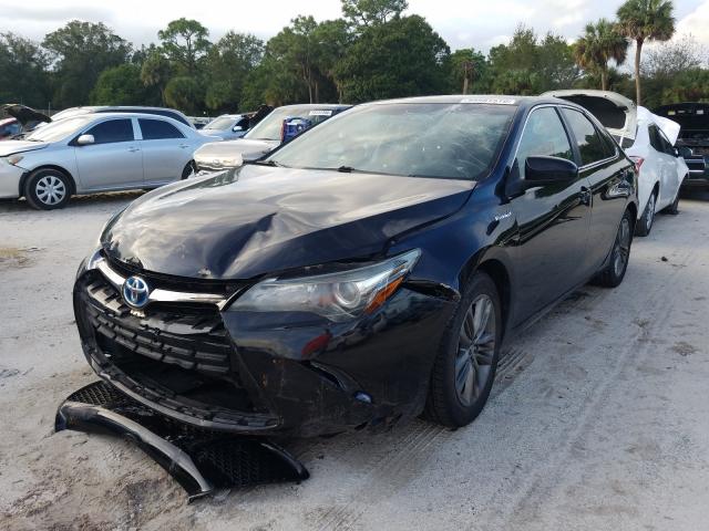 Photo 1 VIN: 4T1BD1FKXFU148990 - TOYOTA CAMRY HYBR 