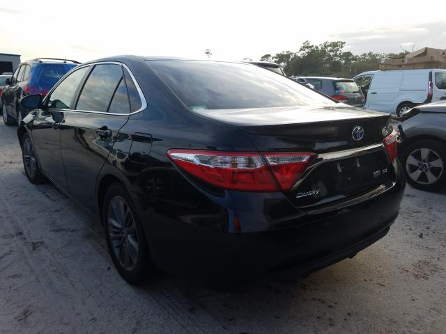 Photo 2 VIN: 4T1BD1FKXFU148990 - TOYOTA CAMRY HYBR 