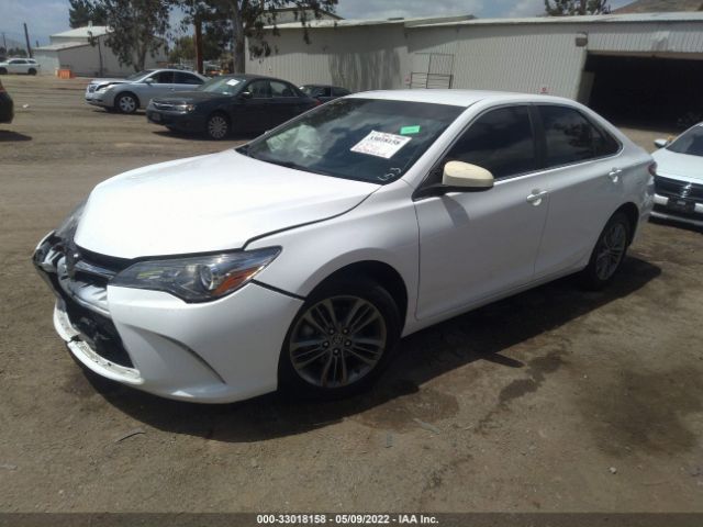 Photo 1 VIN: 4T1BF1FK4HU809829 - TOYOTA CAMRY 