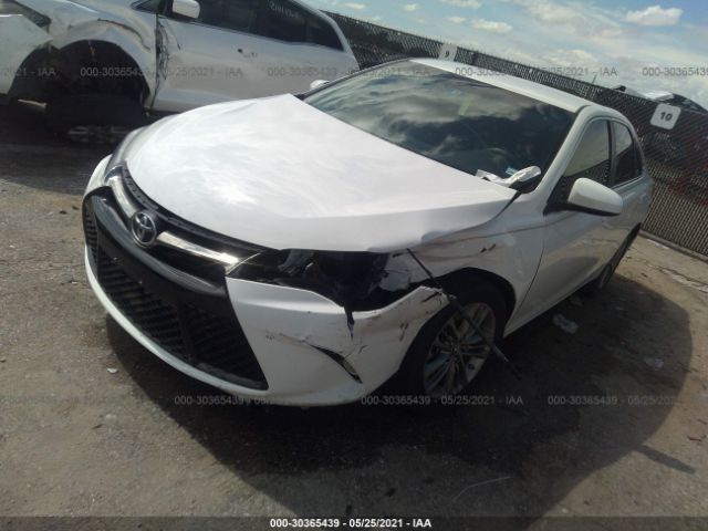 Photo 1 VIN: 4T1BF1FK8HU411801 - TOYOTA CAMRY 