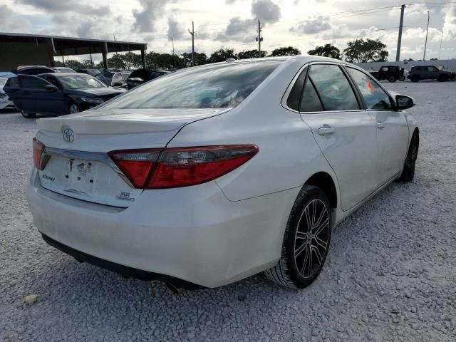 Photo 3 VIN: 4T1BF1FKXGU509565 - TOYOTA CAMRY LE 