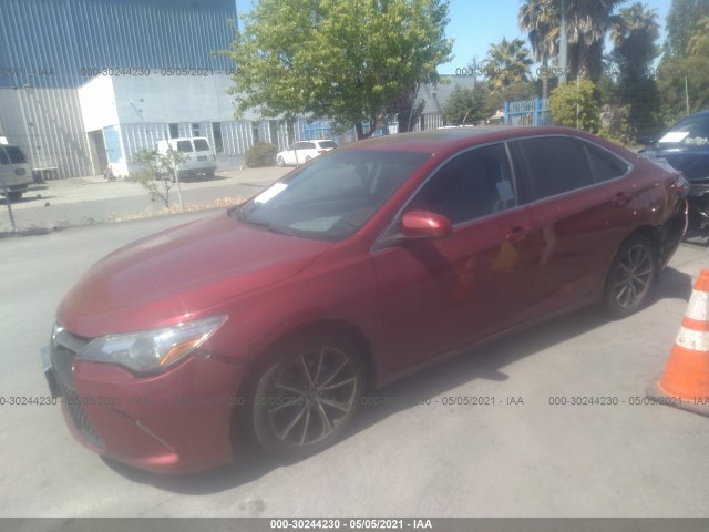 Photo 1 VIN: 4T1BF1FKXGU569409 - TOYOTA CAMRY 