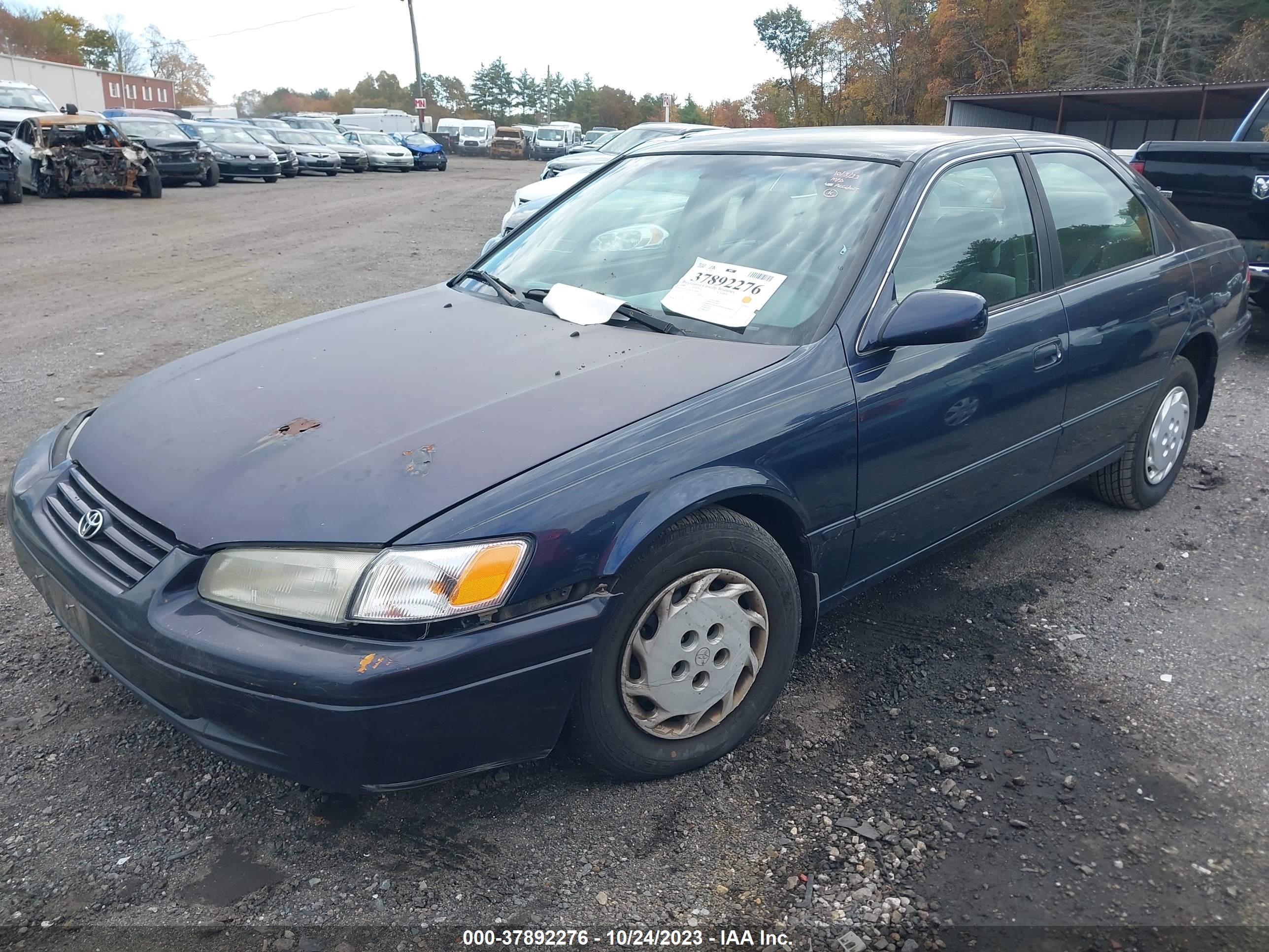 Photo 1 VIN: 4T1BG22K1XU864911 - TOYOTA CAMRY 