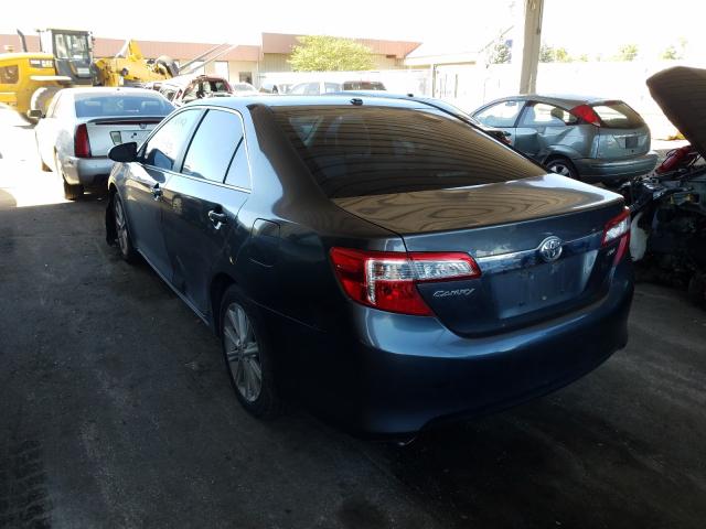 Photo 2 VIN: 4T1BK1FK4DU530001 - TOYOTA CAMRY SE 