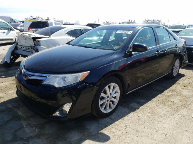 Photo 1 VIN: 4T1BK1FK5CU014308 - TOYOTA CAMRY SE 