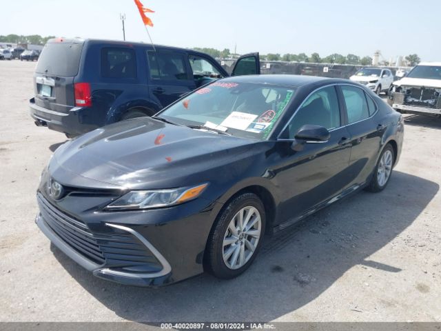 Photo 1 VIN: 4T1C11AK4PU749057 - TOYOTA CAMRY 