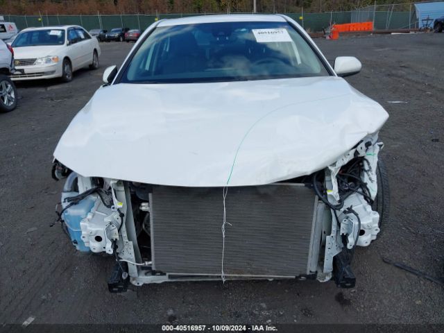 Photo 5 VIN: 4T1C31AK0NU573308 - TOYOTA CAMRY 