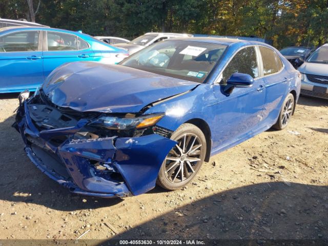 Photo 5 VIN: 4T1T11BK4PU097409 - TOYOTA CAMRY 